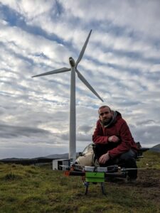 Mike from Zenotech at a wind farm in Wales doing Wind Trials for the Safezone project.